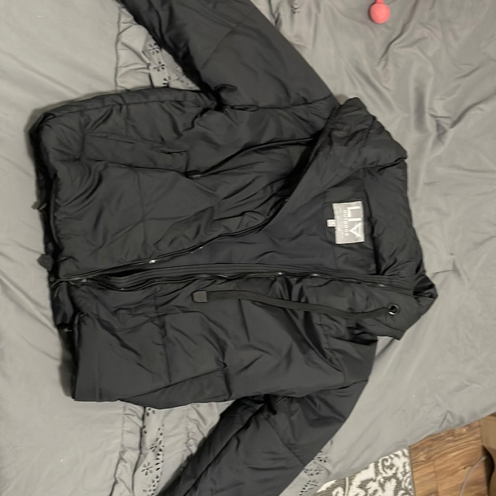 Black puffer jacket, size small more of a loose fit has adjustable waist band.